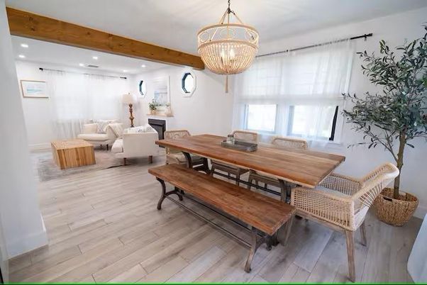 Chandelier, Dining room, Fireplace, Interior, Living room, Recessed Lighting, Wooden Beams, Wood Texture Flooring