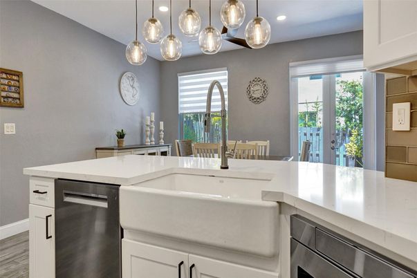 Dining room, Interior, Kitchen, Recessed Lighting, Stainless Steel Appliances, Wood Texture Flooring