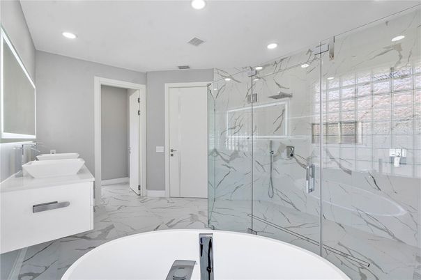 Bathroom, Free Standing Baths, Glass Shower, Interior, Marble, Marble Walls, Recessed Lighting