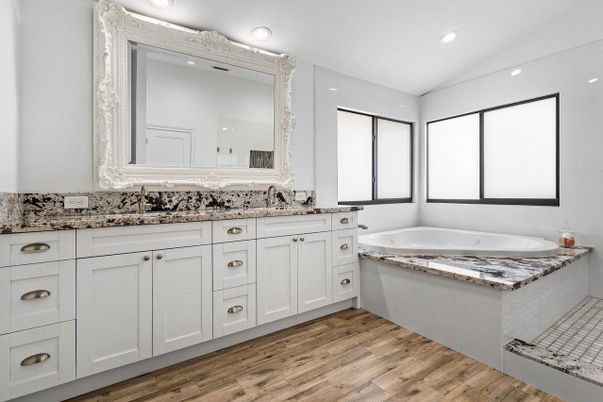 Bathroom, Dual Sink Vanities, Interior, Recessed Lighting, Wood Texture Flooring
