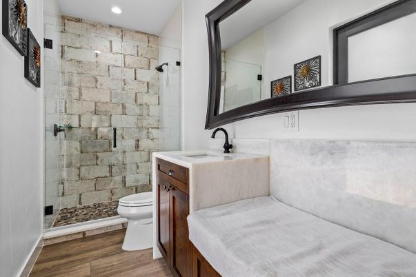 Bathroom, Glass Shower, Interior, Recessed Lighting, Stone Walls, Wood Texture Flooring