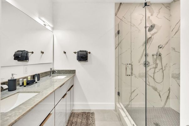 Bathroom, Dual Sink Vanities, Glass Shower, Interior, Marble Walls