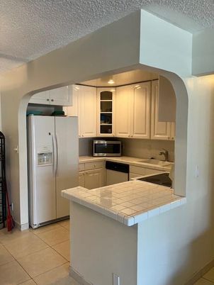 Interior, Kitchen, Tile Countertops, Washer
