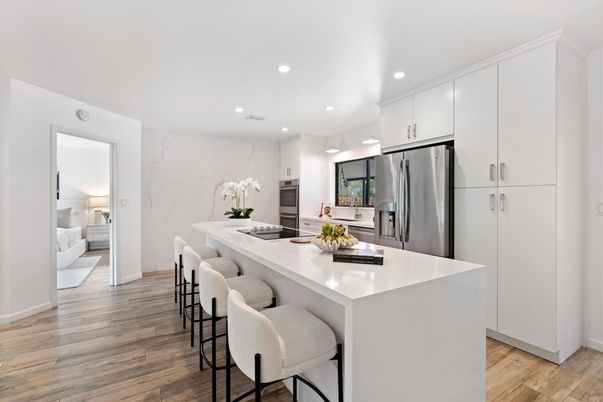Interior, Kitchen, Marble Walls, Recessed Lighting, Stainless Steel Appliances, Wood Texture Flooring