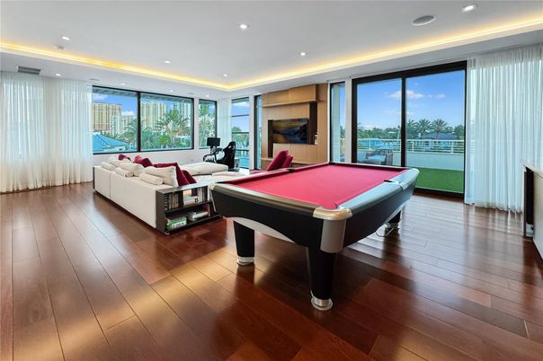 Billiard Table, Fitness Equipment, Game Room, Interior, Living room, Recessed Lighting, Wood Texture Flooring