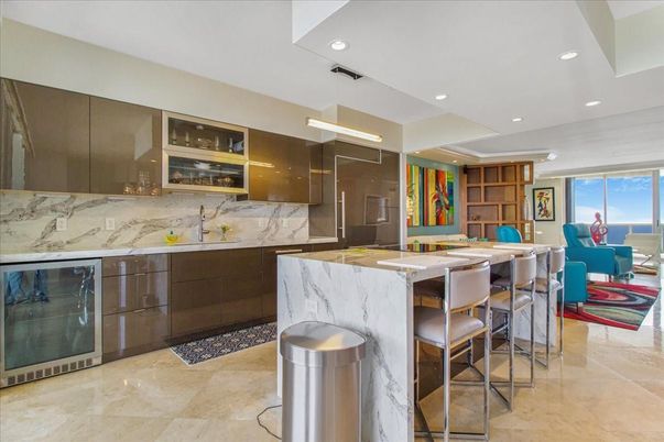 Dining room, Interior, Kitchen, Marble Walls, Pendant Lights, Recessed Lighting, Stainless Steel Appliances, Water