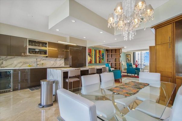 Chandelier, Dining room, Interior, Kitchen, Living room, Marble Walls, Recessed Lighting, Stainless Steel Appliances