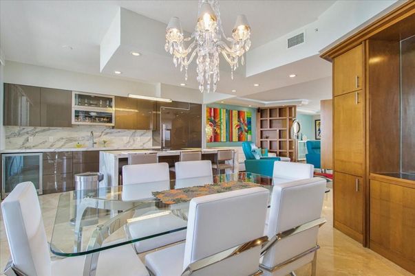 Chandelier, Dining room, Interior, Kitchen, Living room, Marble Walls, Recessed Lighting, Stainless Steel Appliances