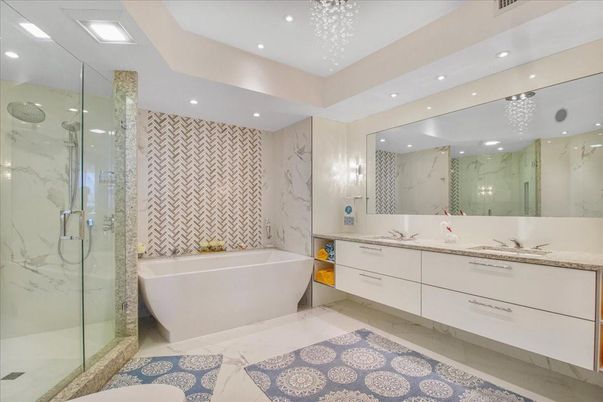 Bathroom, Dual Sink Vanities, Free Standing Baths, Glass Shower, Interior, Marble, Marble Walls, Recessed Lighting