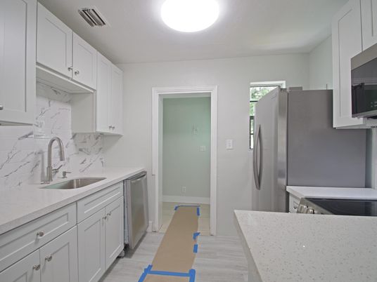 Interior, Kitchen, Marble Walls, Stainless Steel Appliances, Wood Texture Flooring