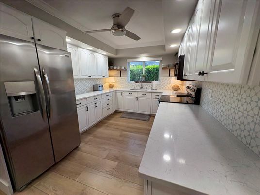 Interior, Kitchen, Recessed Lighting, Stainless Steel Appliances, Wood Texture Flooring