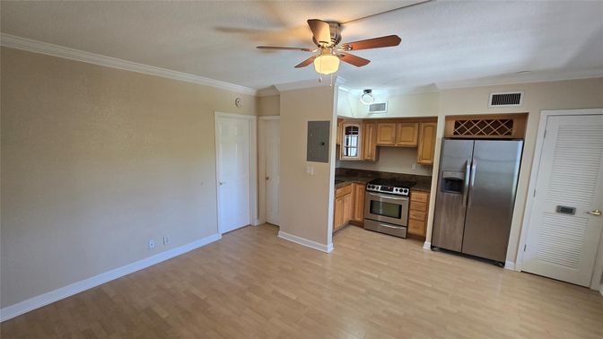 Empty room, Interior, Kitchen, Stainless Steel Appliances, Wood Texture Flooring