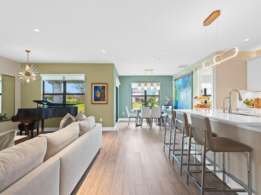 Dining room, Interior, Living room, Pendant Lights, Piano, Recessed Lighting, Wood Texture Flooring
