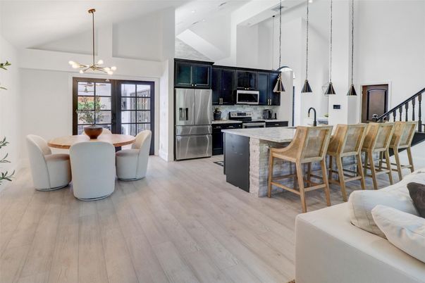 Dining room, Interior, Kitchen, Pendant Lights, Recessed Lighting, Stainless Steel Appliances, Wood Texture Flooring