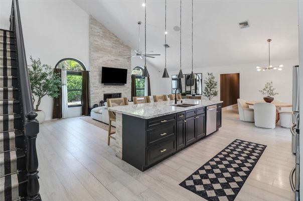 Dining room, Fireplace, Interior, Kitchen, Living room, Pendant Lights, Recessed Lighting, Stone Walls, Wood Texture Flooring