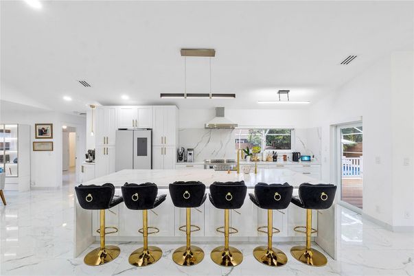 Interior, Kitchen, Marble, Marble Walls, Pendant Lights, Recessed Lighting, Stainless Steel Appliances