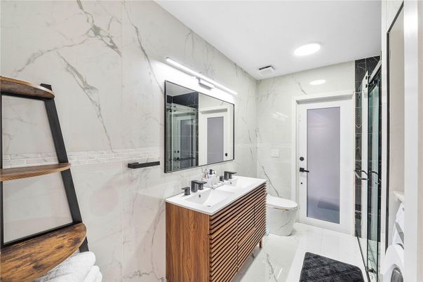 Bathroom, Dual Sink Vanities, Interior, Marble, Marble Walls, Recessed Lighting
