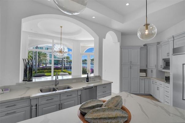 Chandelier, Interior, Kitchen, Marble, Pendant Lights, Recessed Lighting, Stainless Steel Appliances, Water