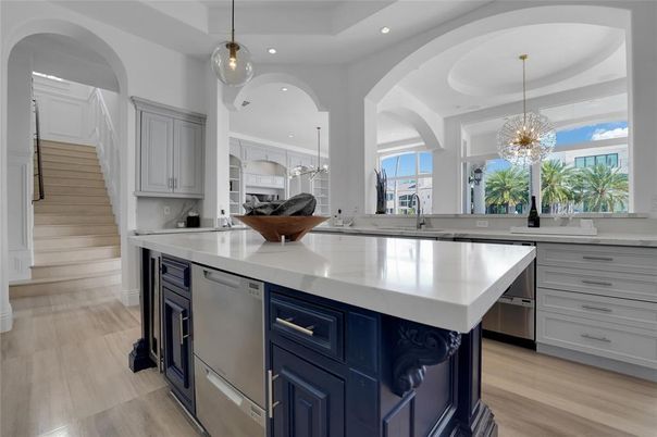 Chandelier, Interior, Kitchen, Pendant Lights, Recessed Lighting, Stainless Steel Appliances, Wood Texture Flooring