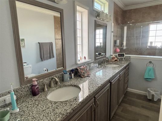 Bathroom, Dual Sink Vanities, Glass Shower, Interior, Wood Texture Flooring