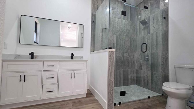 Bathroom, Dual Sink Vanities, Glass Shower, Interior, Wood Texture Flooring