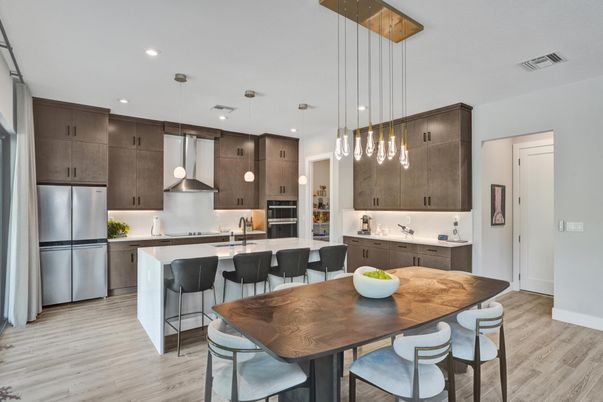 Dining room, Interior, Kitchen, Pendant Lights, Recessed Lighting, Stainless Steel Appliances, Wood Texture Flooring