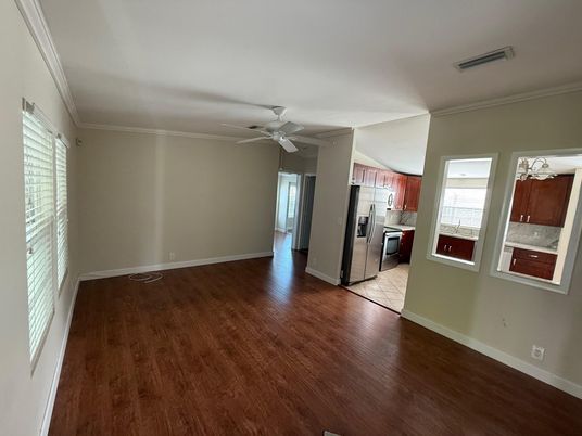 Empty room, Interior, Kitchen, Stainless Steel Appliances, Wood Texture Flooring