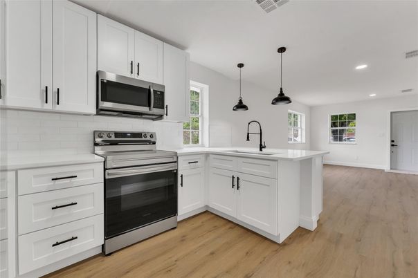 Interior, Kitchen, Pendant Lights, Recessed Lighting, Stainless Steel Appliances, Wood Texture Flooring