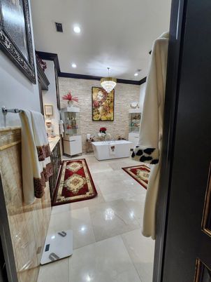 Bathroom, Chandelier, Free Standing Baths, Interior, Recessed Lighting, Stone Walls