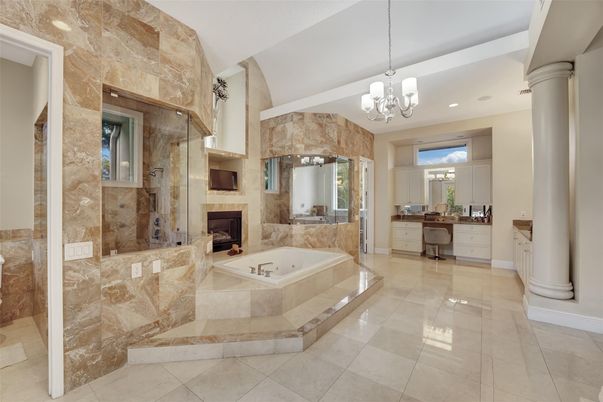 Bathroom, Chandelier, Fireplace, Interior, Pendant Lights, Recessed Lighting, Stone Walls