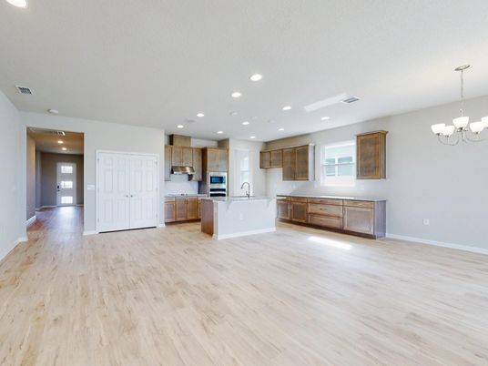 Chandelier, Empty room, Interior, Kitchen, Recessed Lighting, Stainless Steel Appliances, Wood Texture Flooring