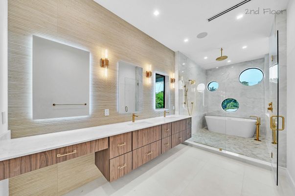 Bathroom, Dual Sink Vanities, Free Standing Baths, Glass Shower, Interior, Marble Walls, Recessed Lighting
