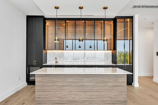 Interior, Kitchen, Marble Walls, Pendant Lights, Recessed Lighting, Wood Texture Flooring