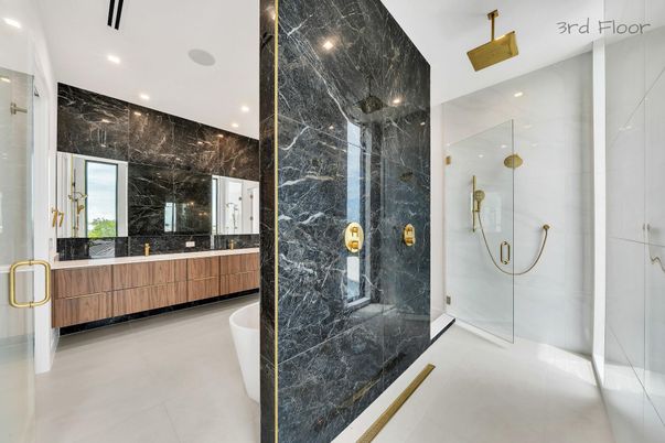 Bathroom, Dual Sink Vanities, Glass Shower, Interior, Marble Walls, Recessed Lighting