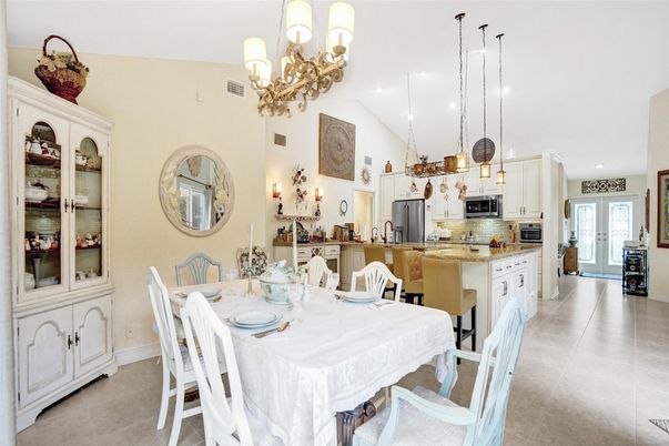 Chandelier, Dining room, Interior, Kitchen, Pendant Lights, Recessed Lighting, Stainless Steel Appliances
