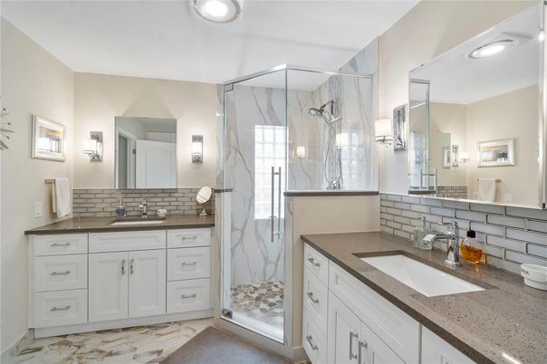 Bathroom, Dual Sink Vanities, Glass Shower, Interior, Marble, Marble Walls, Recessed Lighting
