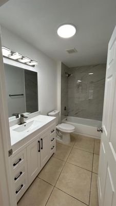 Bathroom, Dual Sink Vanities, Interior, Marble Walls, Recessed Lighting