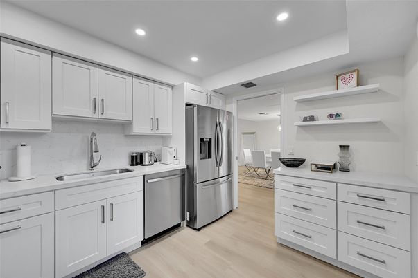 Dining room, Interior, Kitchen, Recessed Lighting, Stainless Steel Appliances, Wood Texture Flooring