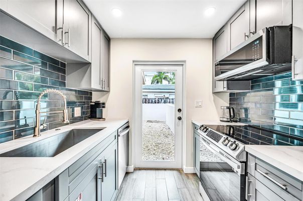 Interior, Kitchen, Recessed Lighting, Stainless Steel Appliances, Wood Texture Flooring