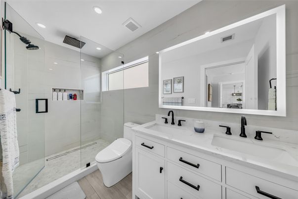 Bathroom, Dual Sink Vanities, Glass Shower, Interior, Recessed Lighting, Wood Texture Flooring