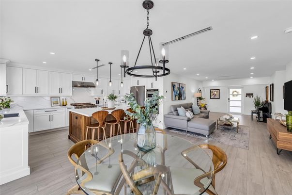 Dining room, Interior, Kitchen, Living room, Pendant Lights, Recessed Lighting, Stainless Steel Appliances, Wood Texture Flooring