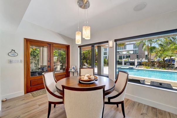 Dining room, Interior, Pendant Lights, Pool, Wood Texture Flooring