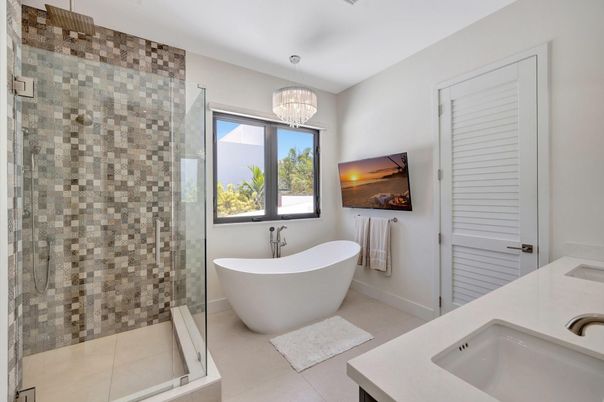 Bathroom, Chandelier, Free Standing Baths, Glass Shower, Interior, Pendant Lights