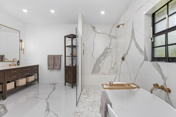 Bathroom, Dual Sink Vanities, Glass Shower, Interior, Marble, Marble Walls, Recessed Lighting