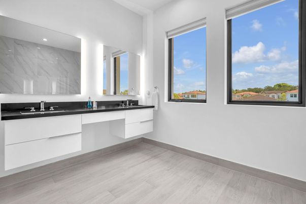 Bathroom, Dual Sink Vanities, Interior, Marble Walls, Recessed Lighting, Wood Texture Flooring