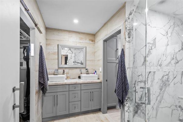 Bathroom, Dual Sink Vanities, Interior, Marble Walls, Recessed Lighting