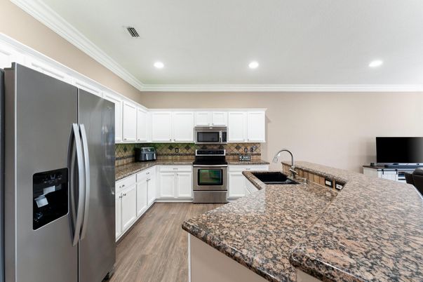 Interior, Kitchen, Recessed Lighting, Stainless Steel Appliances, Wood Texture Flooring