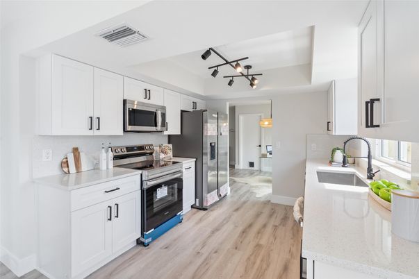 Interior, Kitchen, Pendant Lights, Stainless Steel Appliances, Wood Texture Flooring
