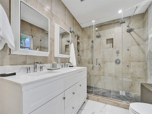 Bathroom, Dual Sink Vanities, Glass Shower, Interior, Marble, Recessed Lighting