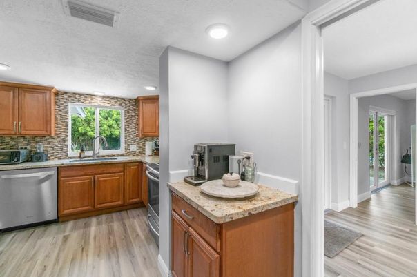 Interior, Kitchen, Recessed Lighting, Stainless Steel Appliances, Wood Texture Flooring